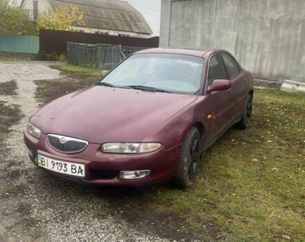 Красный Мазда Кседос 6, объемом двигателя 2 л и пробегом 350 тыс. км за 1200 $, фото 1 на Automoto.ua