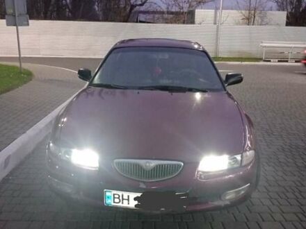 Красный Мазда Кседос 6, объемом двигателя 1.6 л и пробегом 265 тыс. км за 2500 $, фото 1 на Automoto.ua