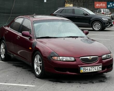 Красный Мазда Кседос 6, объемом двигателя 2 л и пробегом 299 тыс. км за 1250 $, фото 1 на Automoto.ua