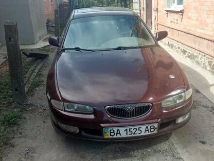 Червоний Мазда Кседос 6, об'ємом двигуна 2 л та пробігом 320 тис. км за 1500 $, фото 1 на Automoto.ua