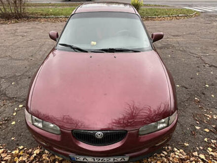 Красный Мазда Кседос 6, объемом двигателя 2 л и пробегом 260 тыс. км за 2800 $, фото 1 на Automoto.ua