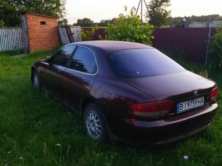 Красный Мазда Кседос 6, объемом двигателя 2 л и пробегом 300 тыс. км за 850 $, фото 1 на Automoto.ua