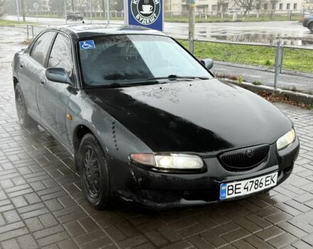 Серый Мазда Кседос 6, объемом двигателя 2 л и пробегом 250 тыс. км за 999 $, фото 2 на Automoto.ua