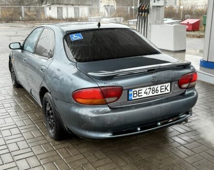 Серый Мазда Кседос 6, объемом двигателя 2 л и пробегом 250 тыс. км за 999 $, фото 5 на Automoto.ua