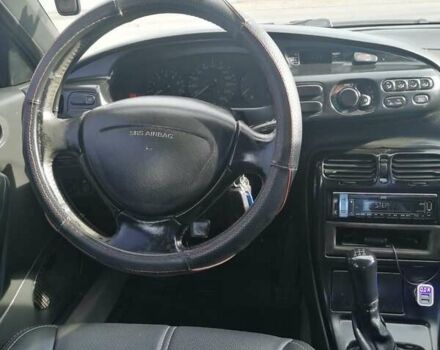 Серый Мазда Кседос 6, объемом двигателя 2 л и пробегом 372 тыс. км за 1700 $, фото 5 на Automoto.ua