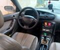 Серый Мазда Кседос 6, объемом двигателя 2.5 л и пробегом 170 тыс. км за 2000 $, фото 2 на Automoto.ua