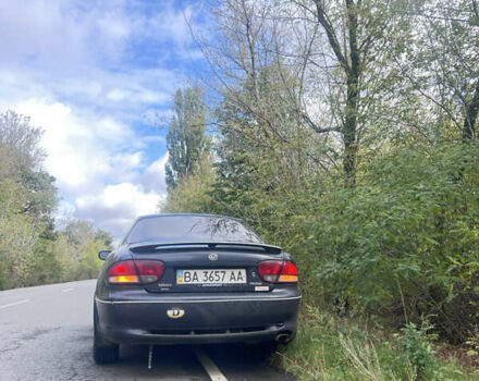 Сірий Мазда Кседос 6, об'ємом двигуна 2 л та пробігом 160 тис. км за 1350 $, фото 4 на Automoto.ua