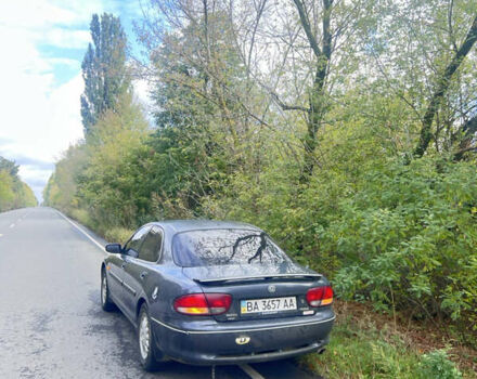 Сірий Мазда Кседос 6, об'ємом двигуна 2 л та пробігом 160 тис. км за 1350 $, фото 5 на Automoto.ua