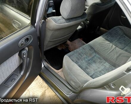 Сірий Мазда Кседос 6, об'ємом двигуна 2 л та пробігом 111 тис. км за 2200 $, фото 4 на Automoto.ua