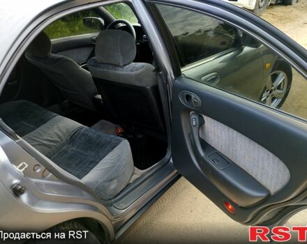 Сірий Мазда Кседос 6, об'ємом двигуна 2 л та пробігом 111 тис. км за 2200 $, фото 6 на Automoto.ua