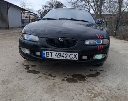 Серый Мазда Кседос 6, объемом двигателя 2 л и пробегом 344 тыс. км за 2700 $, фото 1 на Automoto.ua