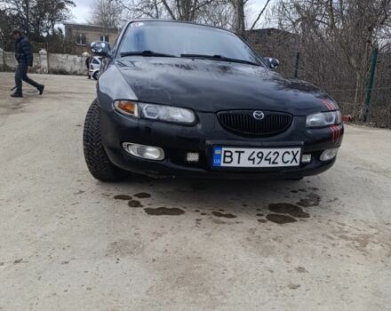 Серый Мазда Кседос 6, объемом двигателя 2 л и пробегом 344 тыс. км за 2800 $, фото 1 на Automoto.ua