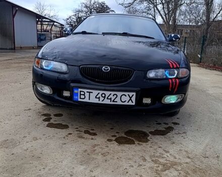 Серый Мазда Кседос 6, объемом двигателя 2 л и пробегом 344 тыс. км за 2700 $, фото 1 на Automoto.ua