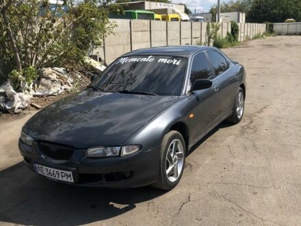 Сірий Мазда Кседос 6, об'ємом двигуна 2 л та пробігом 465 тис. км за 1800 $, фото 1 на Automoto.ua