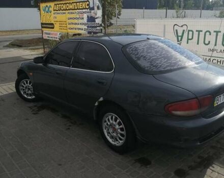 Серый Мазда Кседос 6, объемом двигателя 2 л и пробегом 372 тыс. км за 1700 $, фото 1 на Automoto.ua