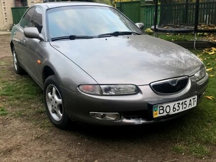 Серый Мазда Кседос 6, объемом двигателя 1.6 л и пробегом 454 тыс. км за 1800 $, фото 1 на Automoto.ua