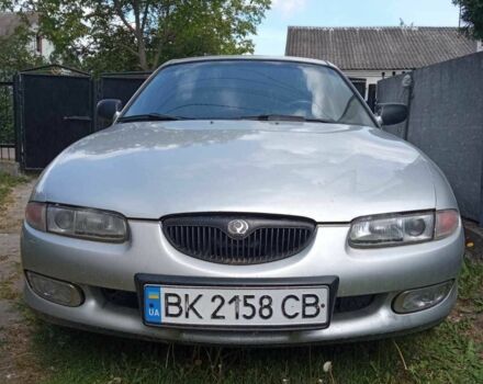 Серый Мазда Кседос 6, объемом двигателя 2 л и пробегом 355 тыс. км за 1300 $, фото 1 на Automoto.ua