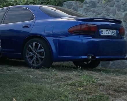 Синій Мазда Кседос 6, об'ємом двигуна 2 л та пробігом 83 тис. км за 2346 $, фото 3 на Automoto.ua
