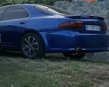Синій Мазда Кседос 6, об'ємом двигуна 2 л та пробігом 83 тис. км за 2346 $, фото 2 на Automoto.ua