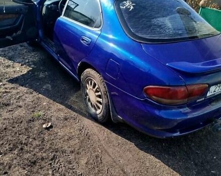 Синий Мазда Кседос 6, объемом двигателя 2 л и пробегом 350 тыс. км за 1750 $, фото 2 на Automoto.ua