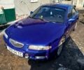Синий Мазда Кседос 6, объемом двигателя 2 л и пробегом 350 тыс. км за 1750 $, фото 1 на Automoto.ua