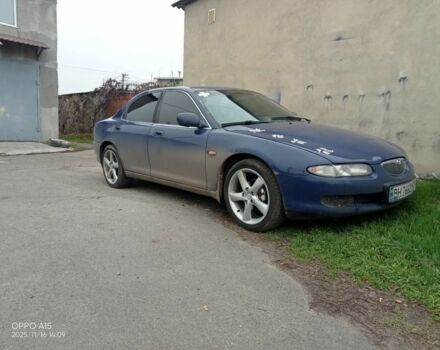 Синий Мазда Кседос 6, объемом двигателя 2 л и пробегом 245 тыс. км за 1800 $, фото 2 на Automoto.ua