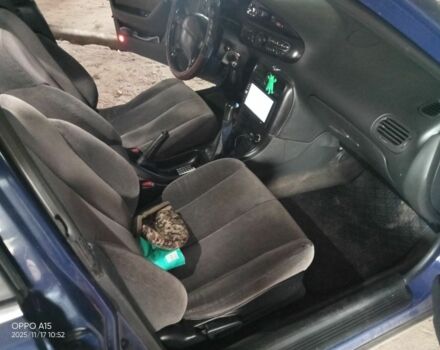 Синий Мазда Кседос 6, объемом двигателя 2 л и пробегом 245 тыс. км за 1800 $, фото 5 на Automoto.ua