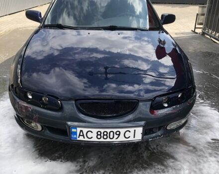 Синий Мазда Кседос 6, объемом двигателя 1.6 л и пробегом 500 тыс. км за 950 $, фото 2 на Automoto.ua