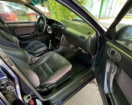 Синий Мазда Кседос 6, объемом двигателя 2 л и пробегом 320 тыс. км за 1450 $, фото 8 на Automoto.ua