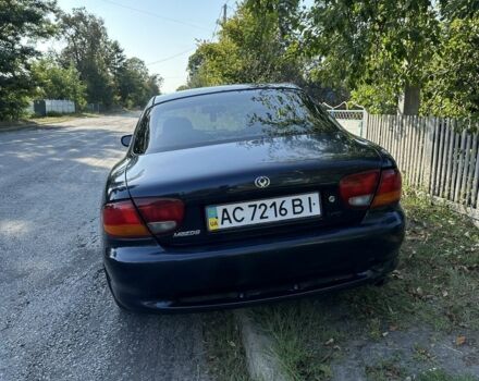 Синій Мазда Кседос 6, об'ємом двигуна 2 л та пробігом 380 тис. км за 1500 $, фото 2 на Automoto.ua