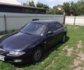 Синій Мазда Кседос 6, об'ємом двигуна 2 л та пробігом 240 тис. км за 2000 $, фото 1 на Automoto.ua