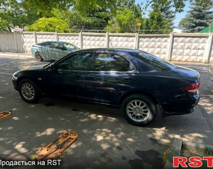 Синий Мазда Кседос 6, объемом двигателя 2 л и пробегом 320 тыс. км за 1450 $, фото 4 на Automoto.ua