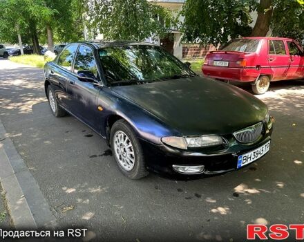 Синий Мазда Кседос 6, объемом двигателя 2 л и пробегом 320 тыс. км за 1450 $, фото 2 на Automoto.ua