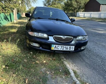 Синій Мазда Кседос 6, об'ємом двигуна 2 л та пробігом 380 тис. км за 1500 $, фото 4 на Automoto.ua