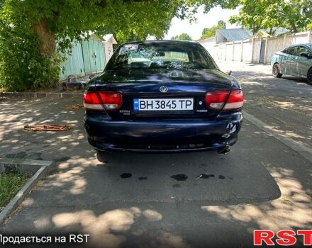 Синий Мазда Кседос 6, объемом двигателя 2 л и пробегом 320 тыс. км за 1450 $, фото 3 на Automoto.ua