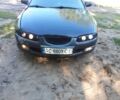 Синий Мазда Кседос 6, объемом двигателя 1.6 л и пробегом 412 тыс. км за 900 $, фото 1 на Automoto.ua