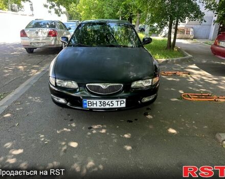 Синий Мазда Кседос 6, объемом двигателя 2 л и пробегом 320 тыс. км за 1450 $, фото 1 на Automoto.ua