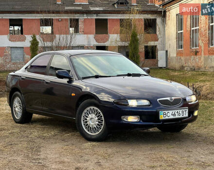 Синий Мазда Кседос 6, объемом двигателя 2 л и пробегом 300 тыс. км за 2250 $, фото 4 на Automoto.ua