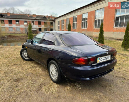 Синий Мазда Кседос 6, объемом двигателя 2 л и пробегом 300 тыс. км за 2250 $, фото 23 на Automoto.ua