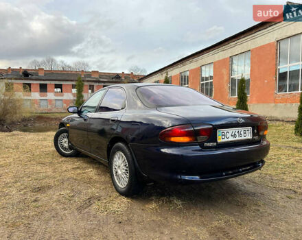 Синий Мазда Кседос 6, объемом двигателя 2 л и пробегом 300 тыс. км за 2250 $, фото 22 на Automoto.ua