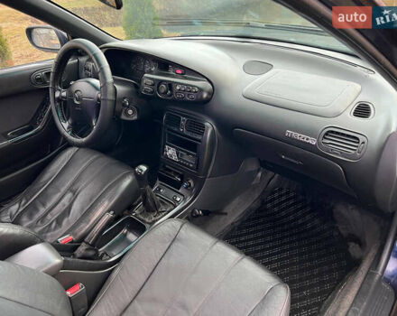 Синий Мазда Кседос 6, объемом двигателя 2 л и пробегом 300 тыс. км за 2250 $, фото 41 на Automoto.ua