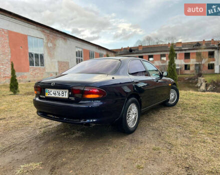 Синий Мазда Кседос 6, объемом двигателя 2 л и пробегом 300 тыс. км за 2250 $, фото 35 на Automoto.ua