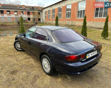 Синий Мазда Кседос 6, объемом двигателя 2 л и пробегом 300 тыс. км за 2250 $, фото 24 на Automoto.ua