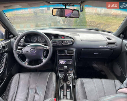 Синий Мазда Кседос 6, объемом двигателя 2 л и пробегом 300 тыс. км за 2250 $, фото 44 на Automoto.ua
