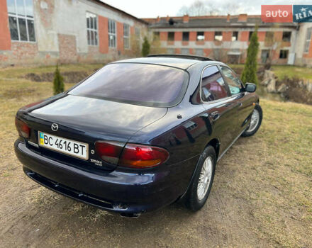 Синий Мазда Кседос 6, объемом двигателя 2 л и пробегом 300 тыс. км за 2250 $, фото 34 на Automoto.ua