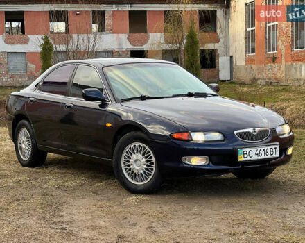 Синий Мазда Кседос 6, объемом двигателя 2 л и пробегом 300 тыс. км за 2250 $, фото 2 на Automoto.ua