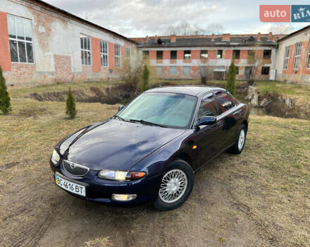 Синий Мазда Кседос 6, объемом двигателя 2 л и пробегом 300 тыс. км за 2250 $, фото 20 на Automoto.ua