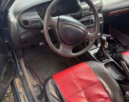 Синий Мазда Кседос 6, объемом двигателя 2 л и пробегом 290 тыс. км за 650 $, фото 4 на Automoto.ua