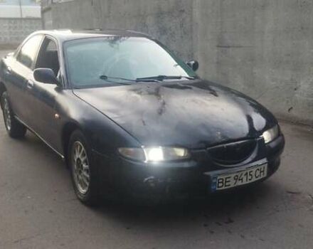 Синий Мазда Кседос 6, объемом двигателя 2 л и пробегом 325 тыс. км за 1250 $, фото 1 на Automoto.ua