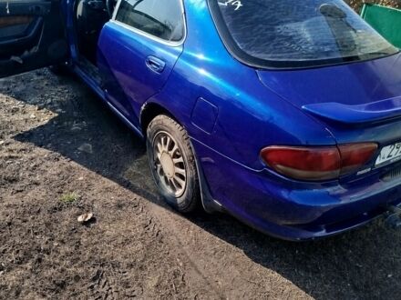 Синій Мазда Кседос 6, об'ємом двигуна 2 л та пробігом 280 тис. км за 2000 $, фото 1 на Automoto.ua